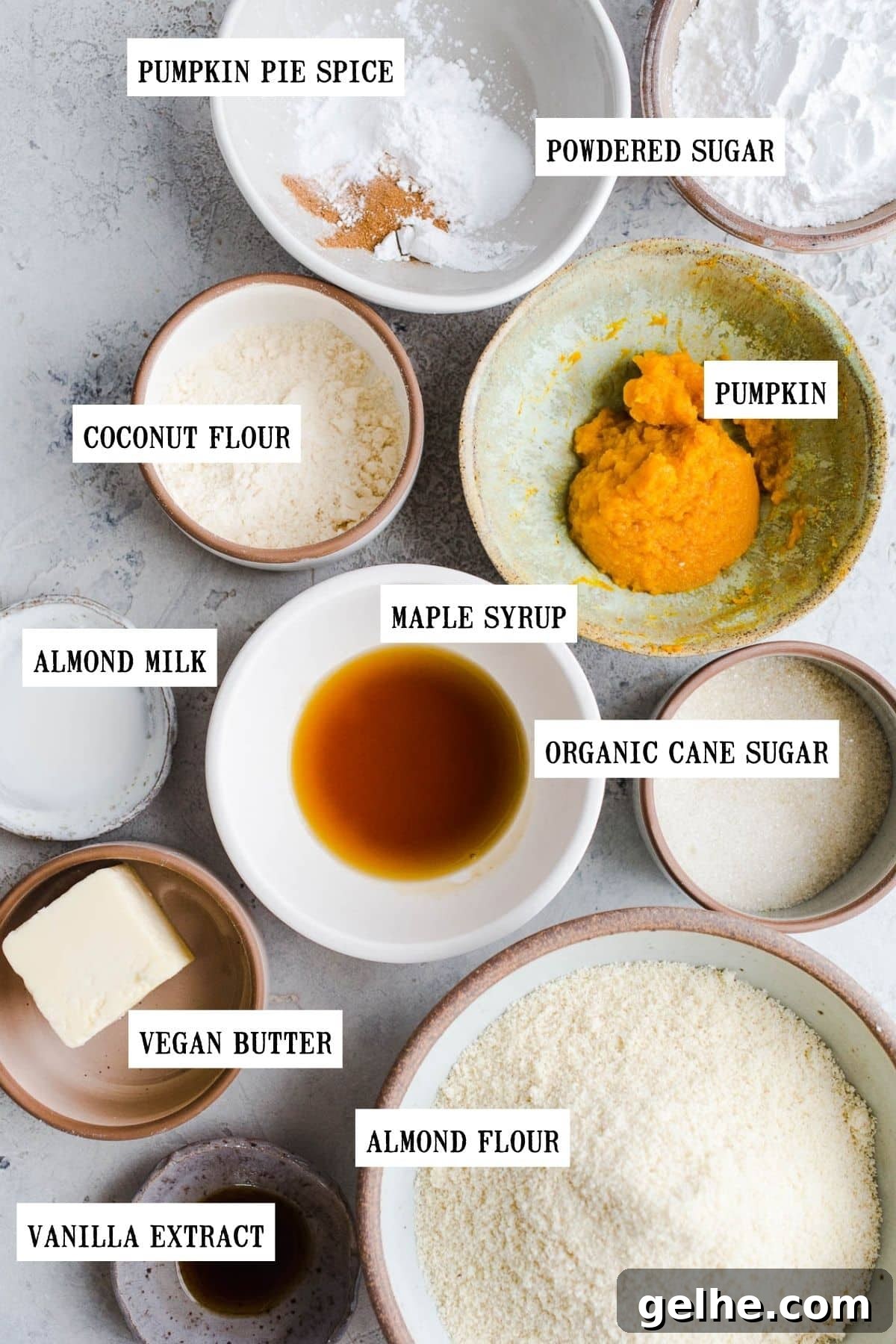Ingredients to make cookies in small bowls.