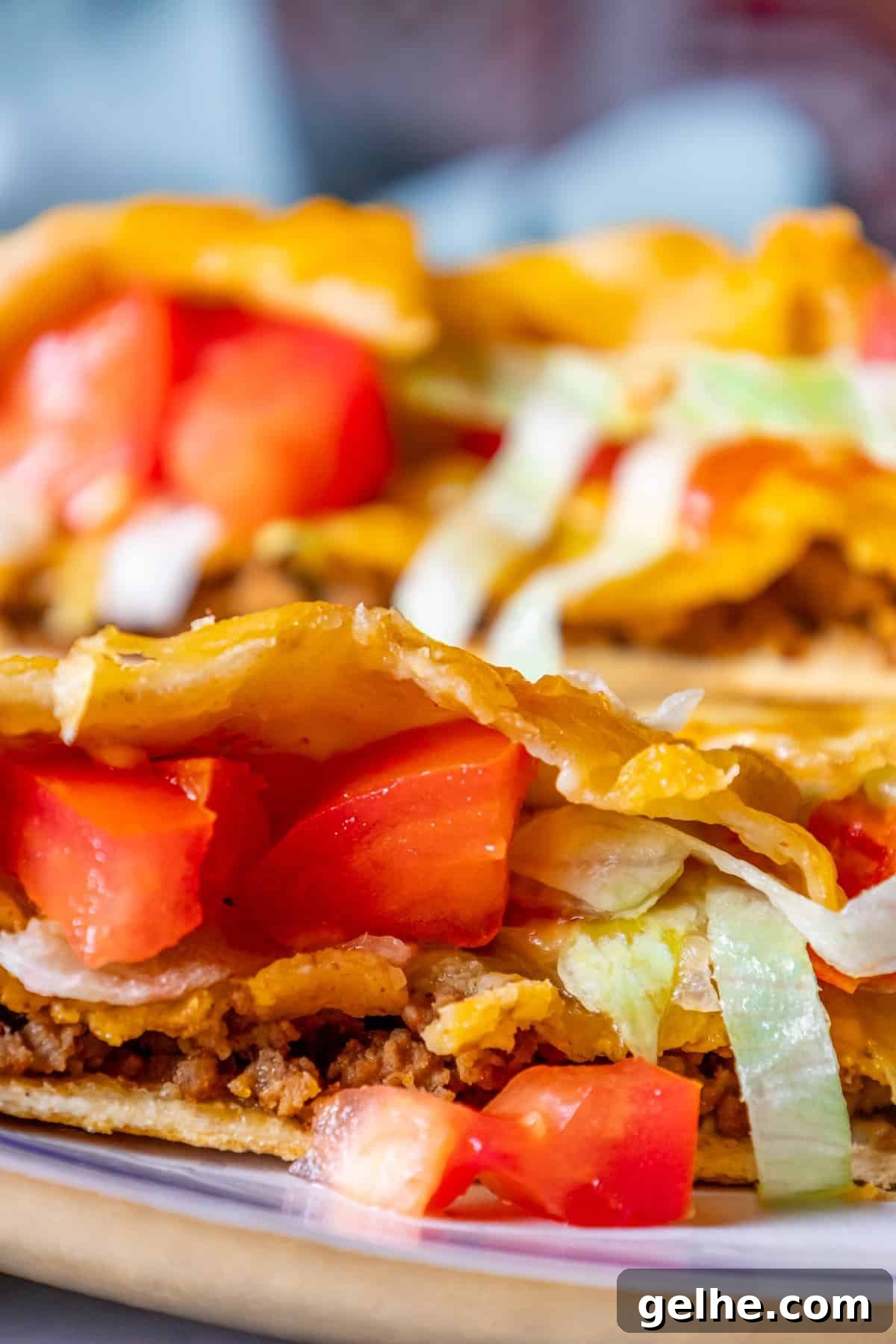 Crispy Homemade Crunchwrap Recipe: Copycat Taco Bell Wrap 14 A homemade plate with two CrunchWrap tacos on it.