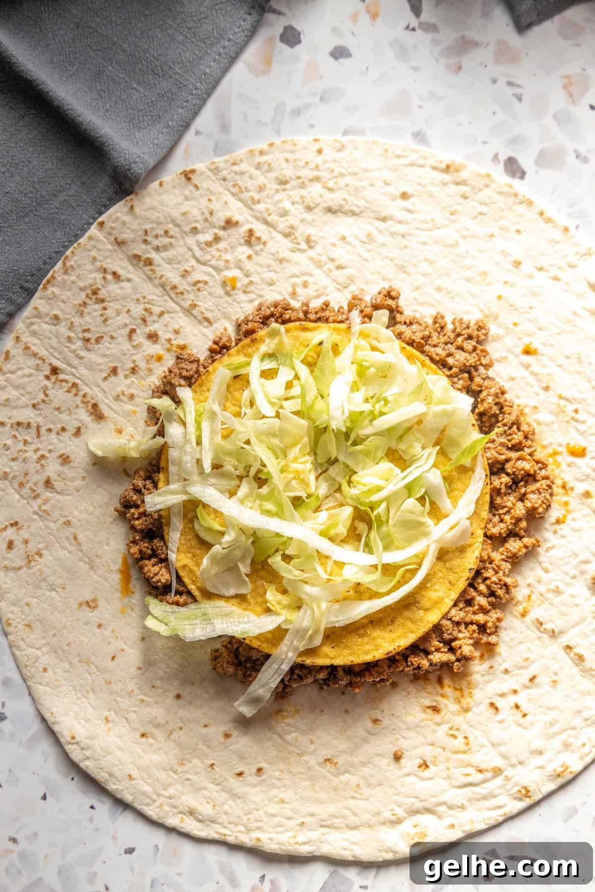 Crispy Homemade Crunchwrap Recipe: Copycat Taco Bell Wrap 8 A homemade burrito filled with meat and cabbage.