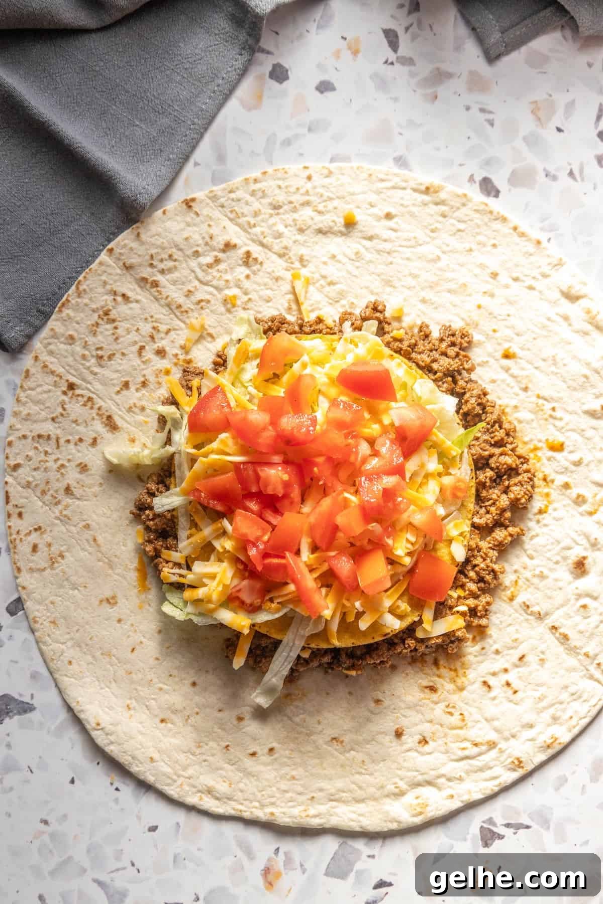 Crispy Homemade Crunchwrap Recipe: Copycat Taco Bell Wrap 9 A homemade burrito filled with meat and vegetables.