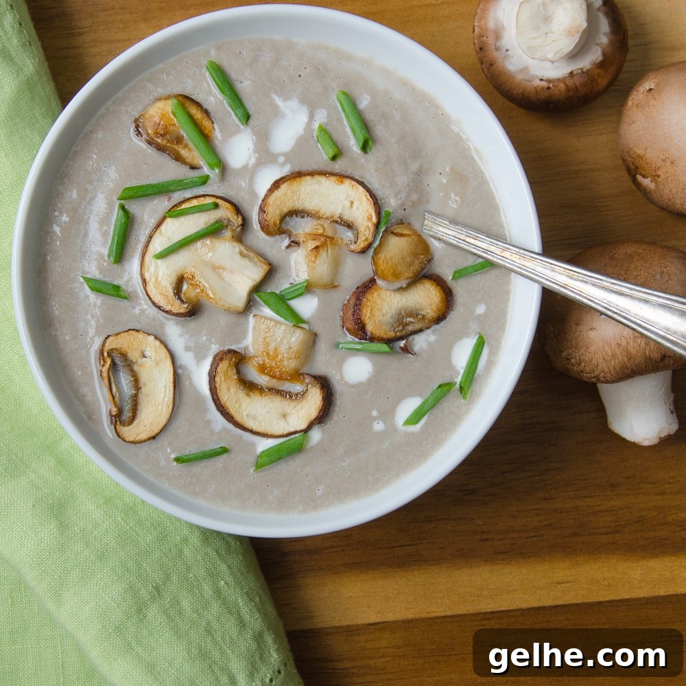 Silky Mushroom Bisque Recipe 7 creamy mushroom bisque on a wooden board