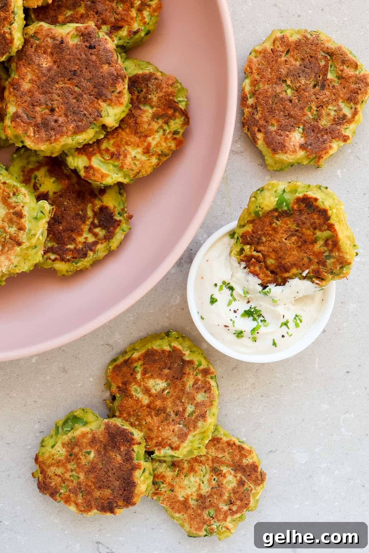 Edamame fritters on plate and table.