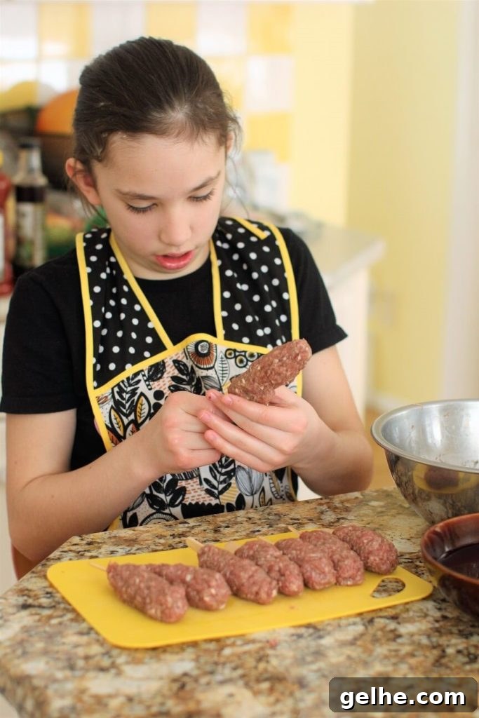 shape the food on a stick into a burger pop