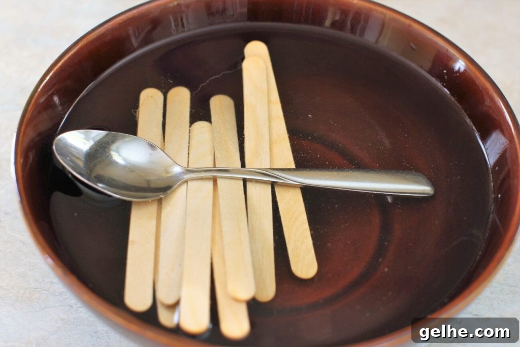 soak the popsicle sticks in hot water for the food on a stick burger pops