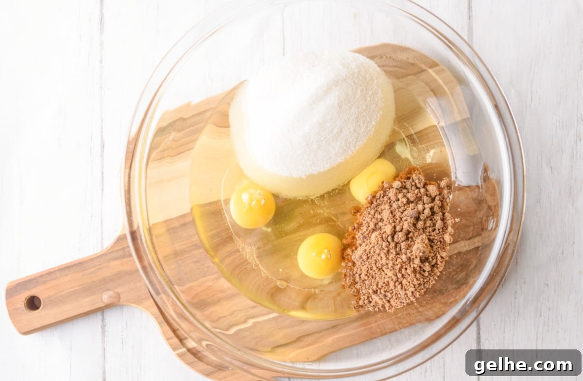 mix together sugars and eggs