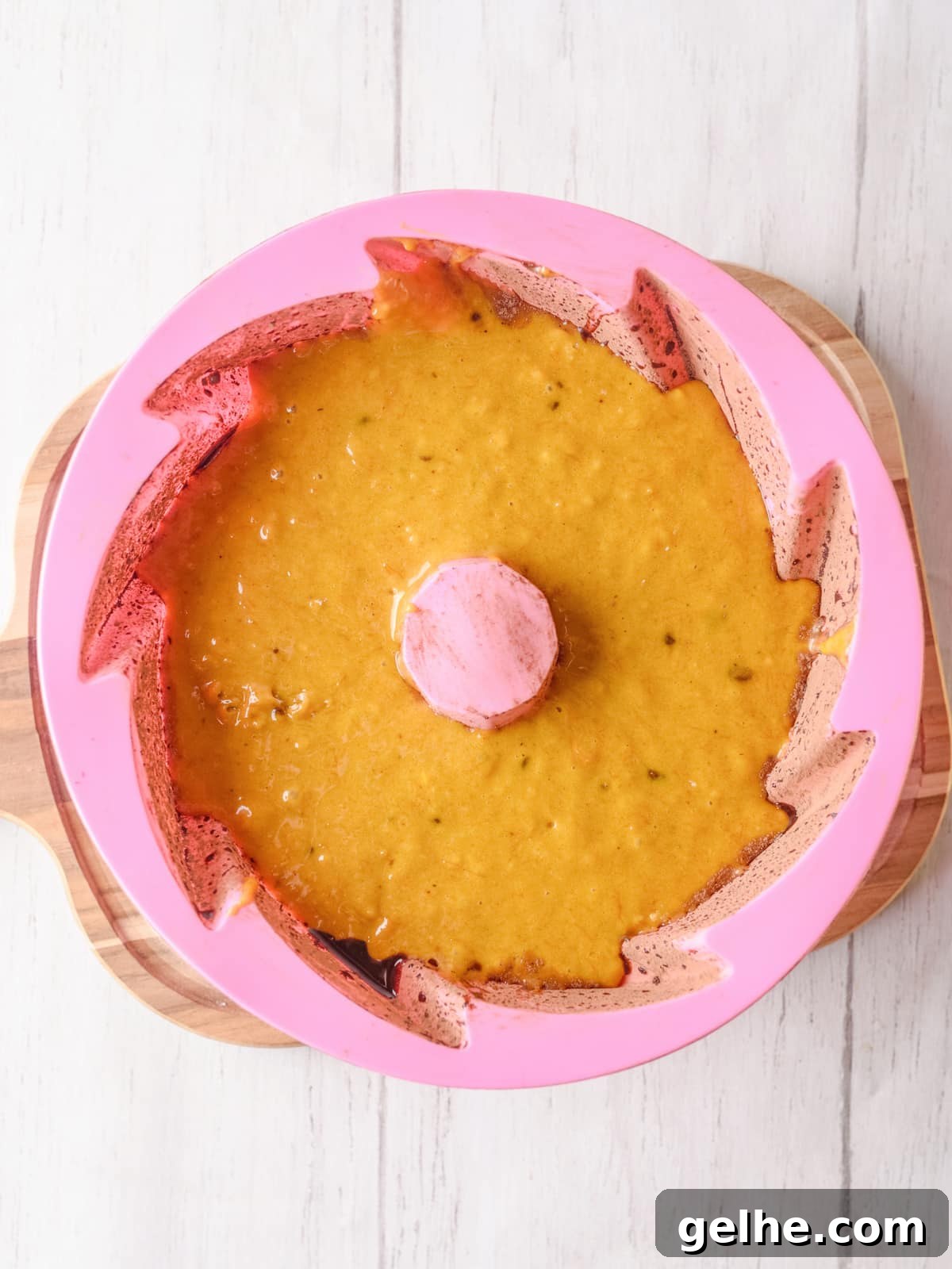 add cake batter to prepared bundt pan