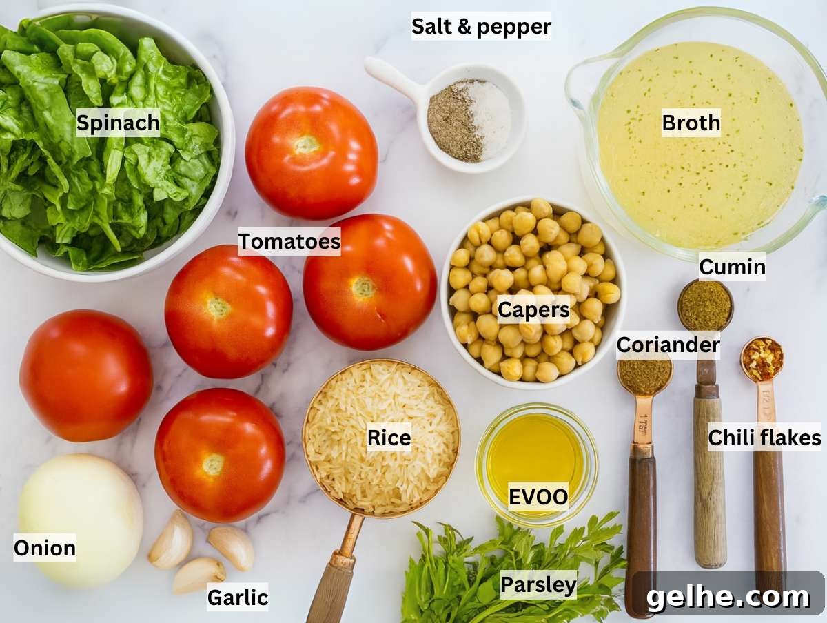 Oven-Baked Stuffed Tomatoes with Herb Breadcrumbs 4 Raw ingredients for stuffed tomatoes, including vine tomatoes, rice, chickpeas, spinach, onion, garlic, olive oil, and fresh parsley.