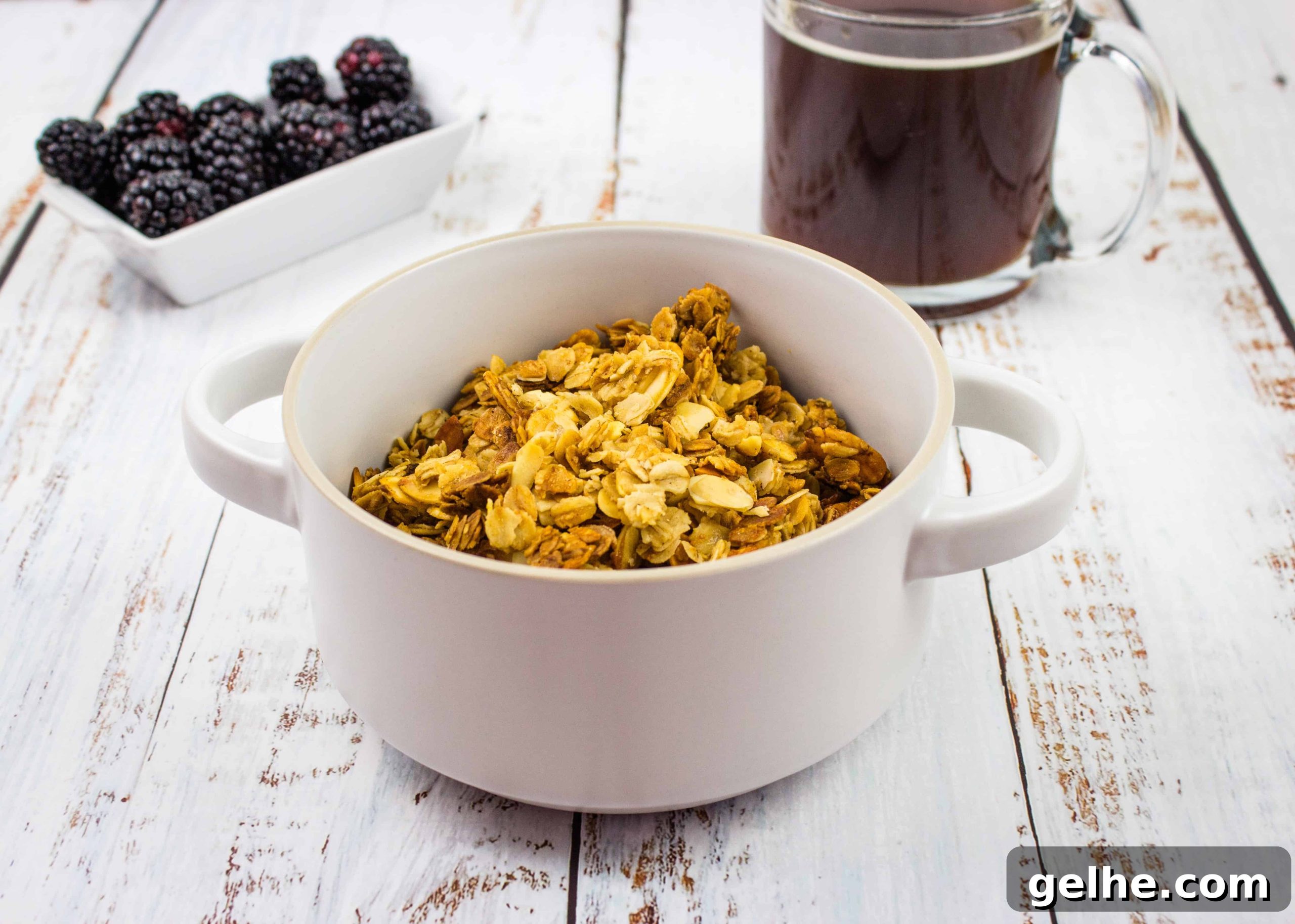 Honey Almond Granola in a white bowl.